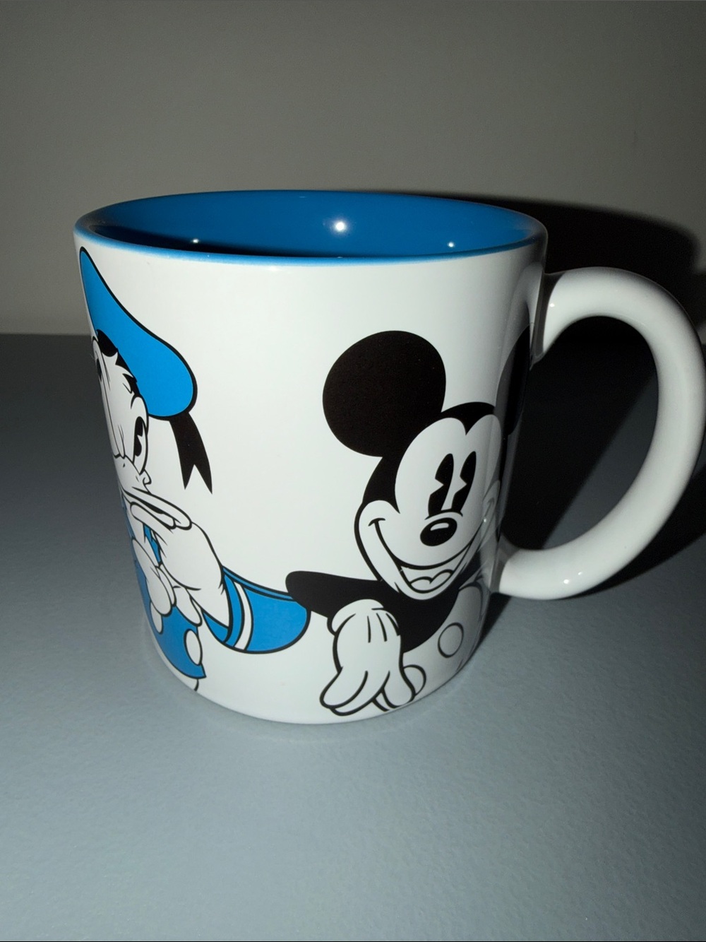 NWOT Disney White Ceramic Mug with Blue Interior and Character Art